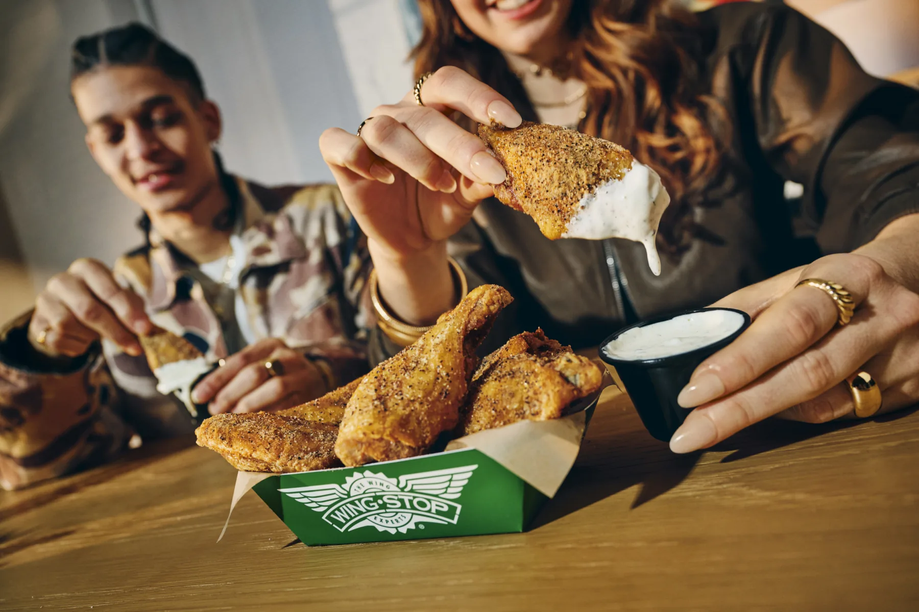Official Wingstop lifestyle photo of Lemon Pepper classic wings